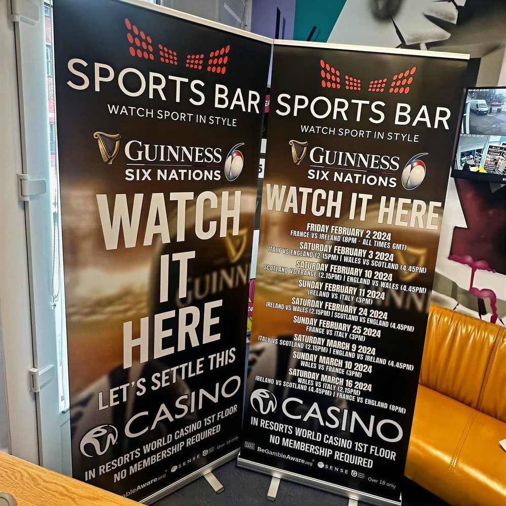 Two custom pull-up roller banners printed by Vivid Design & Print Co in Stafford