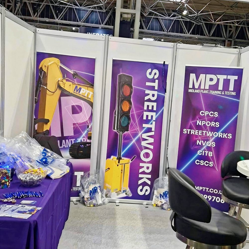 Custom roller banners printed by Vivid Design & Print Co in Stafford used on an exhibition stand